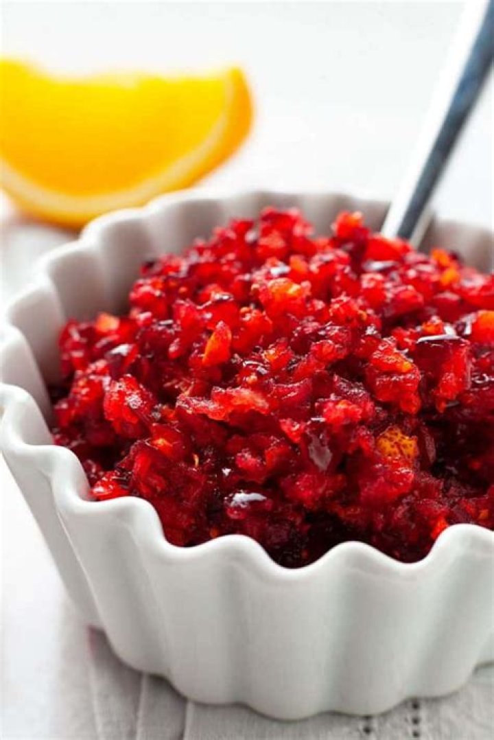 Ingredients for cranberry orange relish: cranberries, orange, apple, sugar.